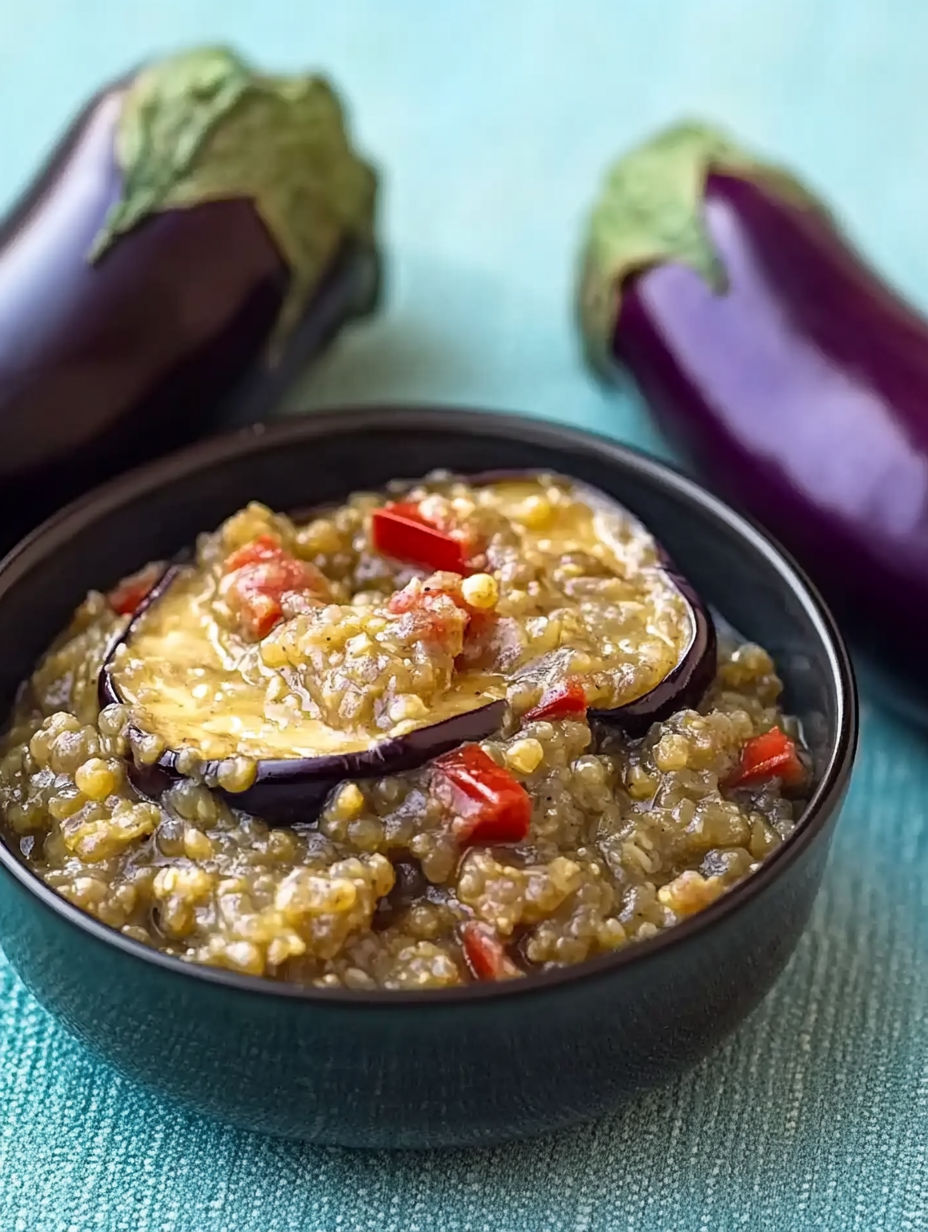 A bowl of food with a purple eggplant and a green eggplant.