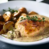 A plate of food with chicken and mushrooms.